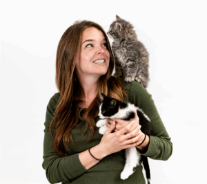 Dr. Jacklyn Ellis holding two cats